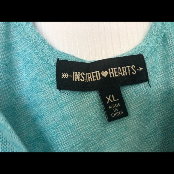 Top with criss cross back and fringe along bottom - Picture 3 of 3